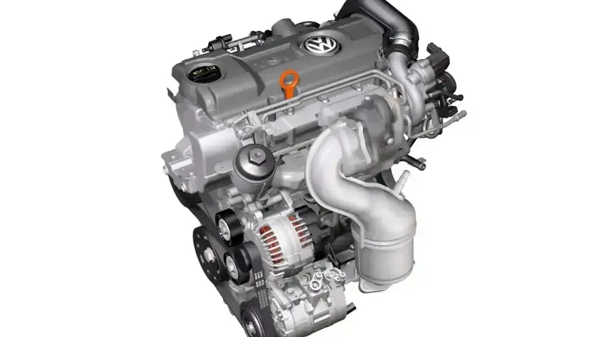 Silnik Volkswagen z turbosprężarką. Czy on to jest diesel? Wygląda na to, że tak, z charakterystycznym układem dolotowym.